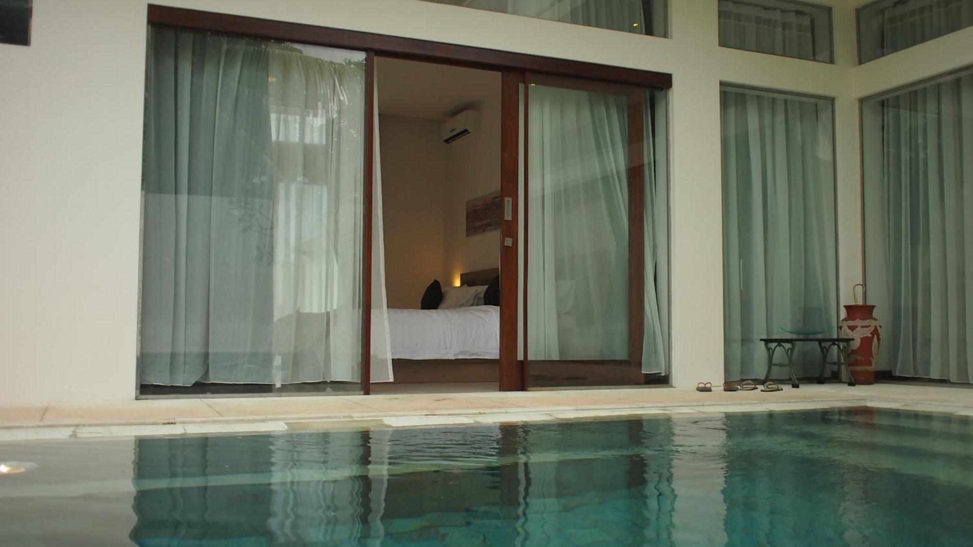 แปซิฟิค บีช คอตเทจ Hotel Mangsit ภายนอก รูปภาพ