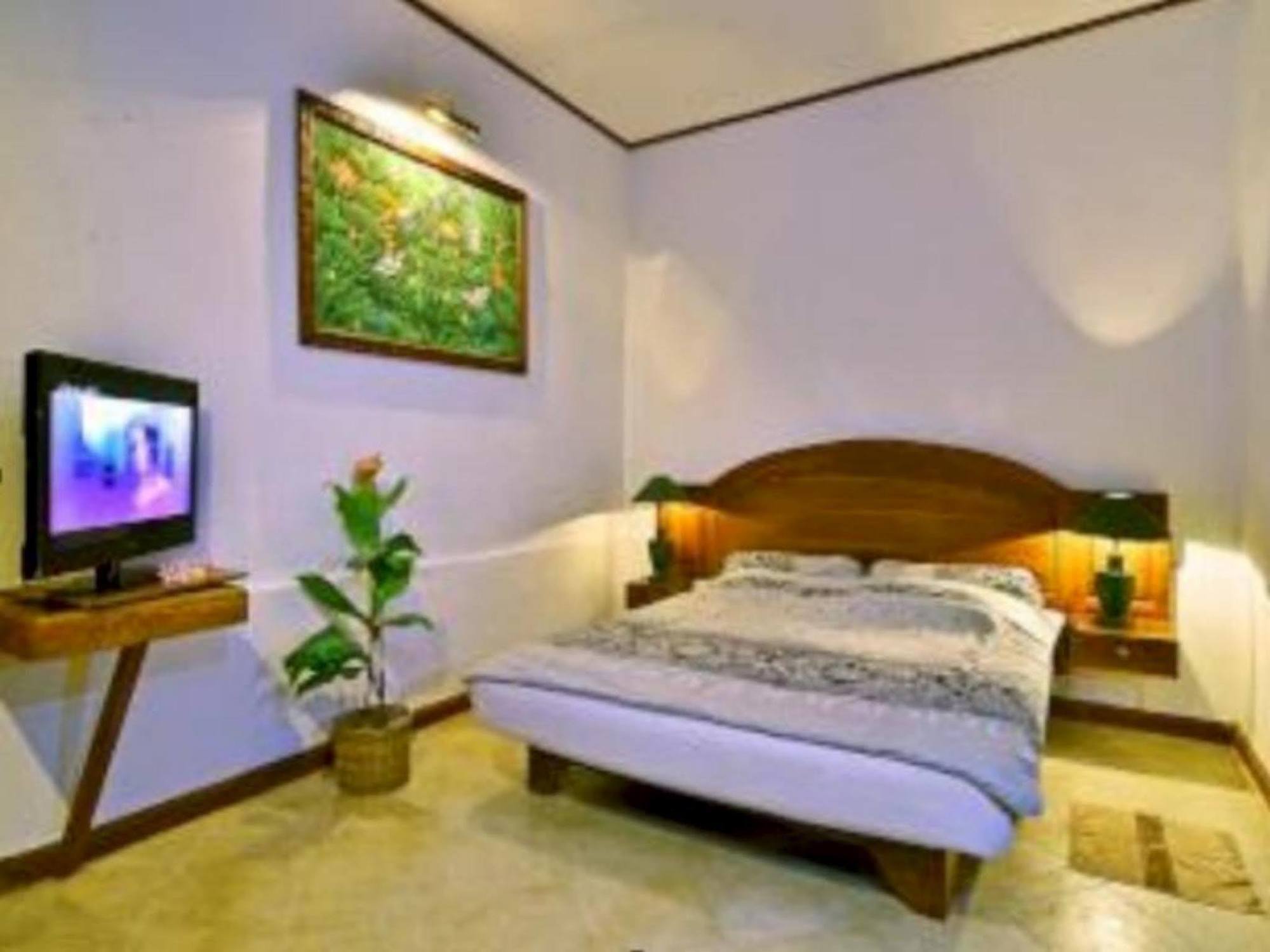 แปซิฟิค บีช คอตเทจ Hotel Mangsit ภายนอก รูปภาพ